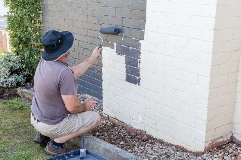 Exterior wall being painted
